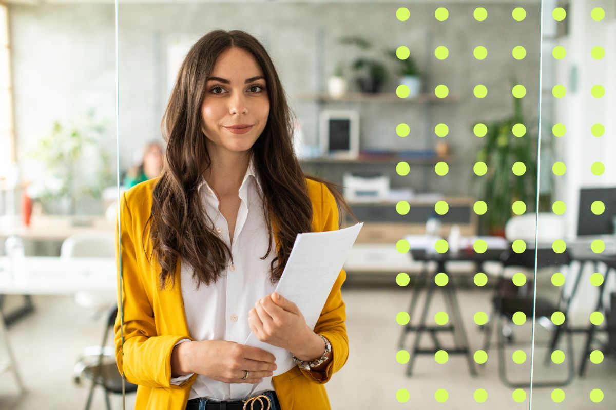 happy employee, woman in blazer